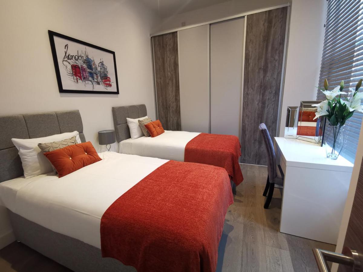 City Prime Apartments Лондон Экстерьер фото A typical bedroom at the hotel