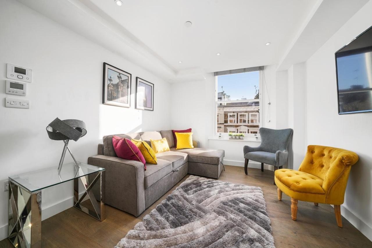 City Prime Apartments Лондон Экстерьер фото A living room in a serviced apartment in London