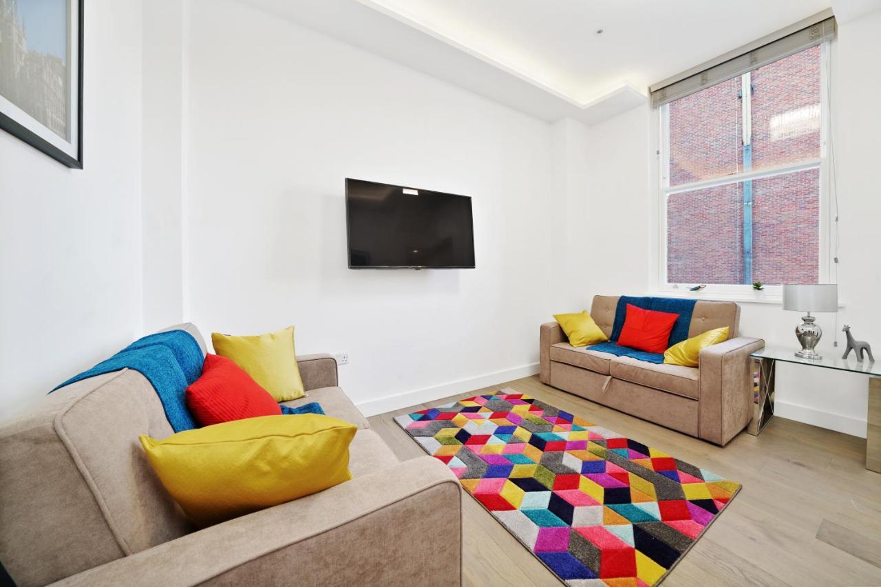 City Prime Apartments Лондон Экстерьер фото A living room in a serviced apartment in London