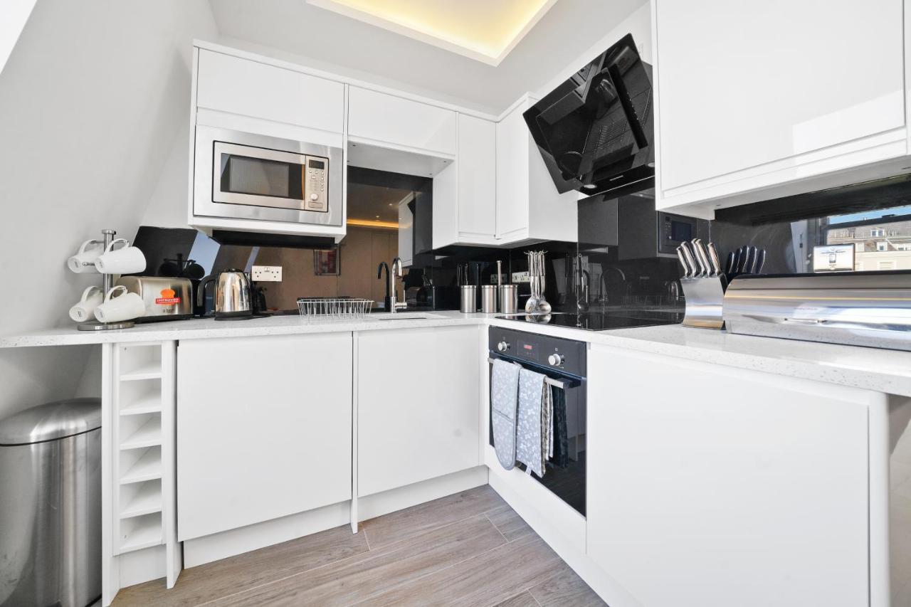 City Prime Apartments Лондон Экстерьер фото A modern kitchen