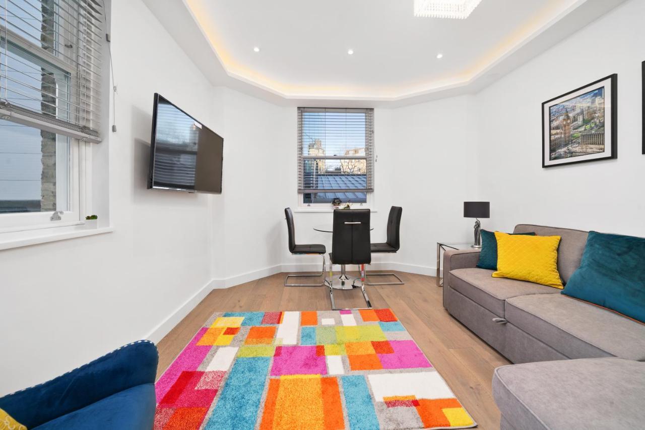 City Prime Apartments Лондон Экстерьер фото A living room in a serviced apartment in London